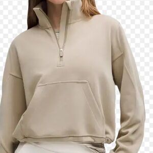 “SIZE 8” WOMENS LULULEMON Brushed Softstreme Half
Zip Sweatshirt
